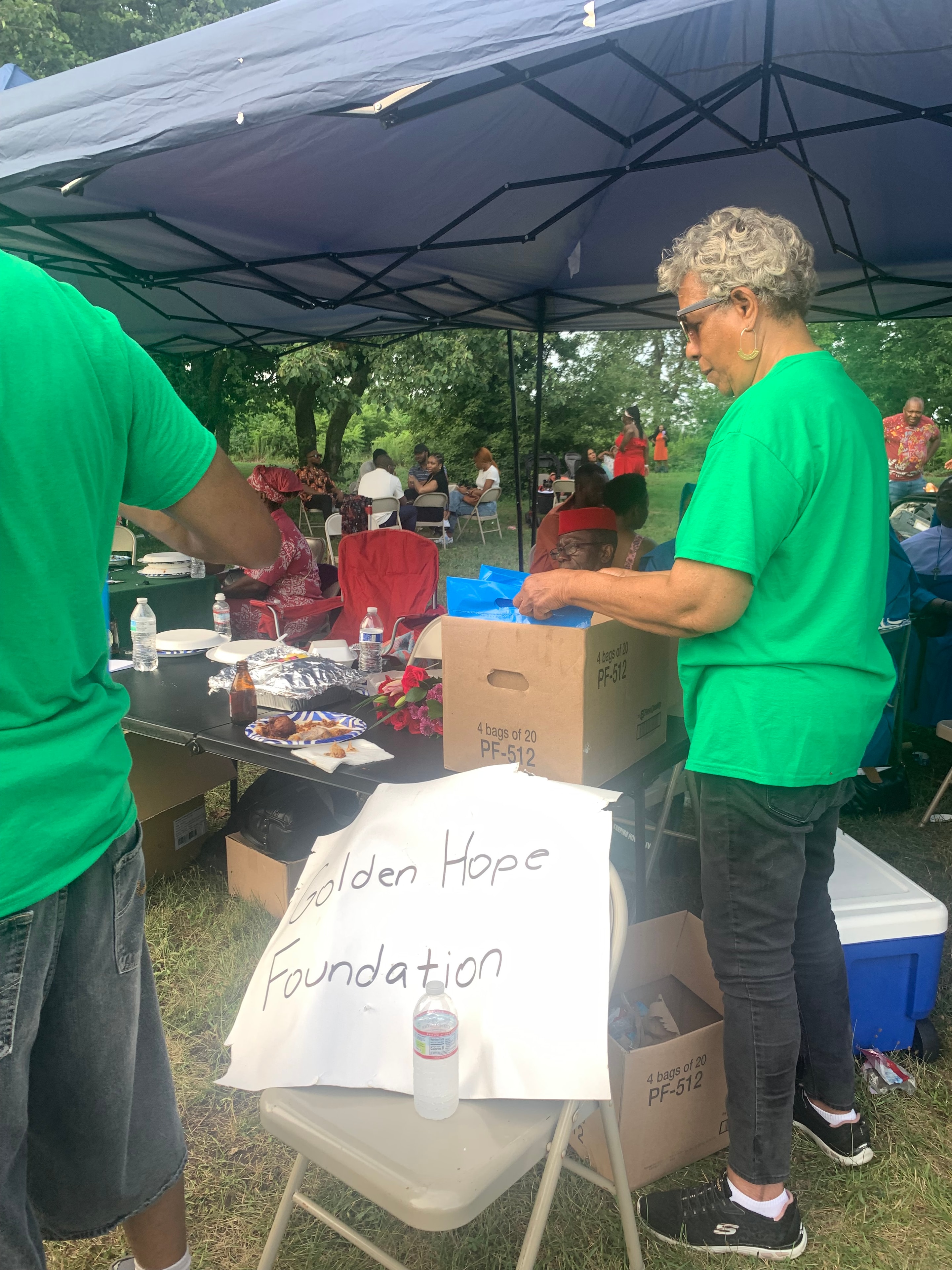 Golden Hope Foundation volunteer at Back to School Drive community event